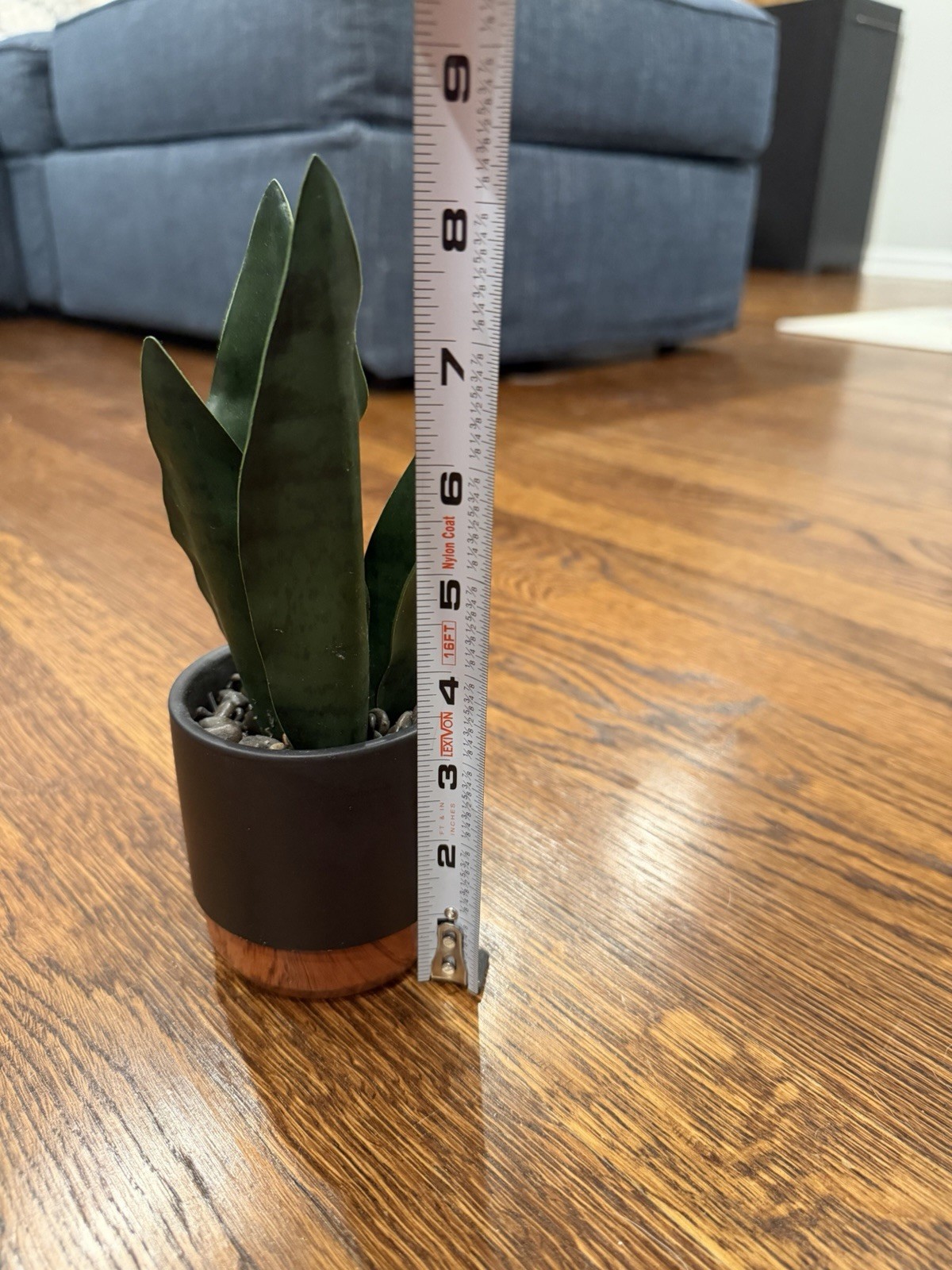 Artificial Snake Plant Houseplant in Black Pot w/ Wood Base, Pebbles, 8 in