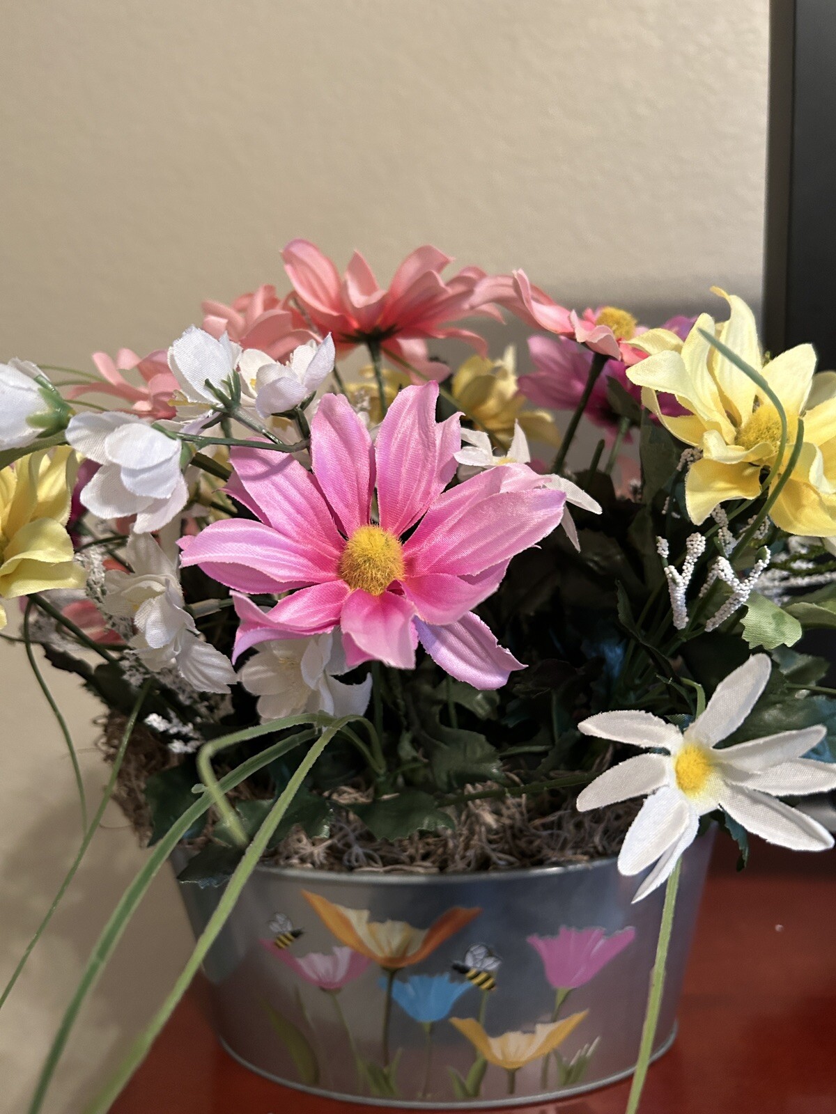 Spring Flower Arrangement in a Silver Metal Canister with Flower and Bee Motif