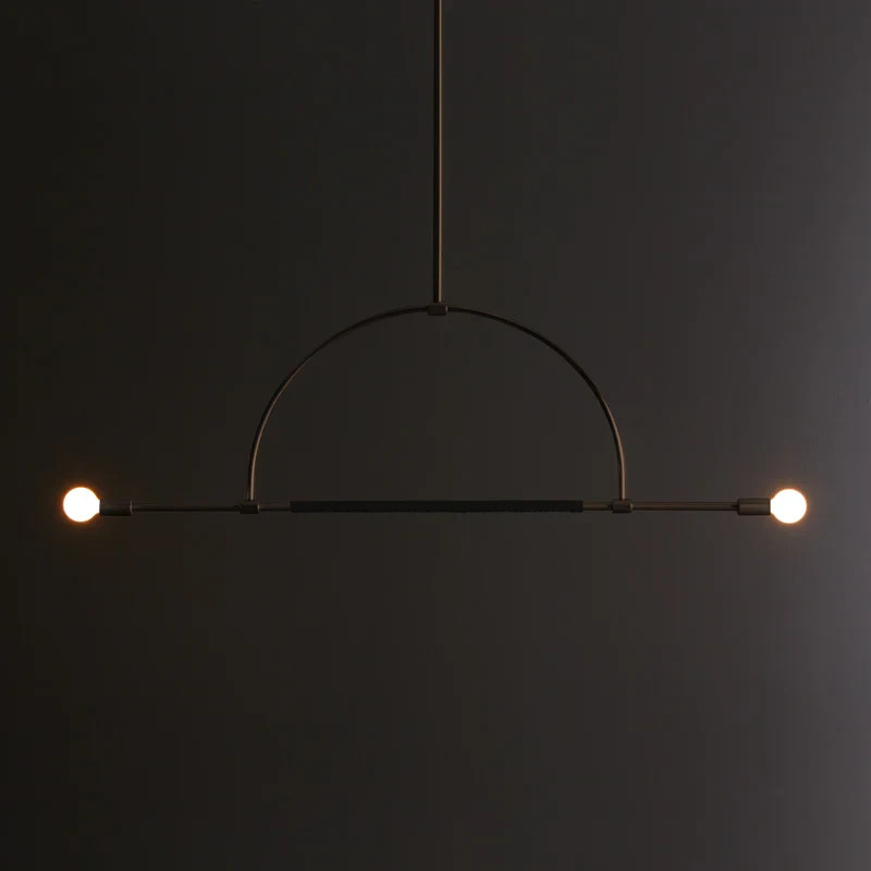 The Ellis Light is made from solid brass, with an optional leather wrap that is