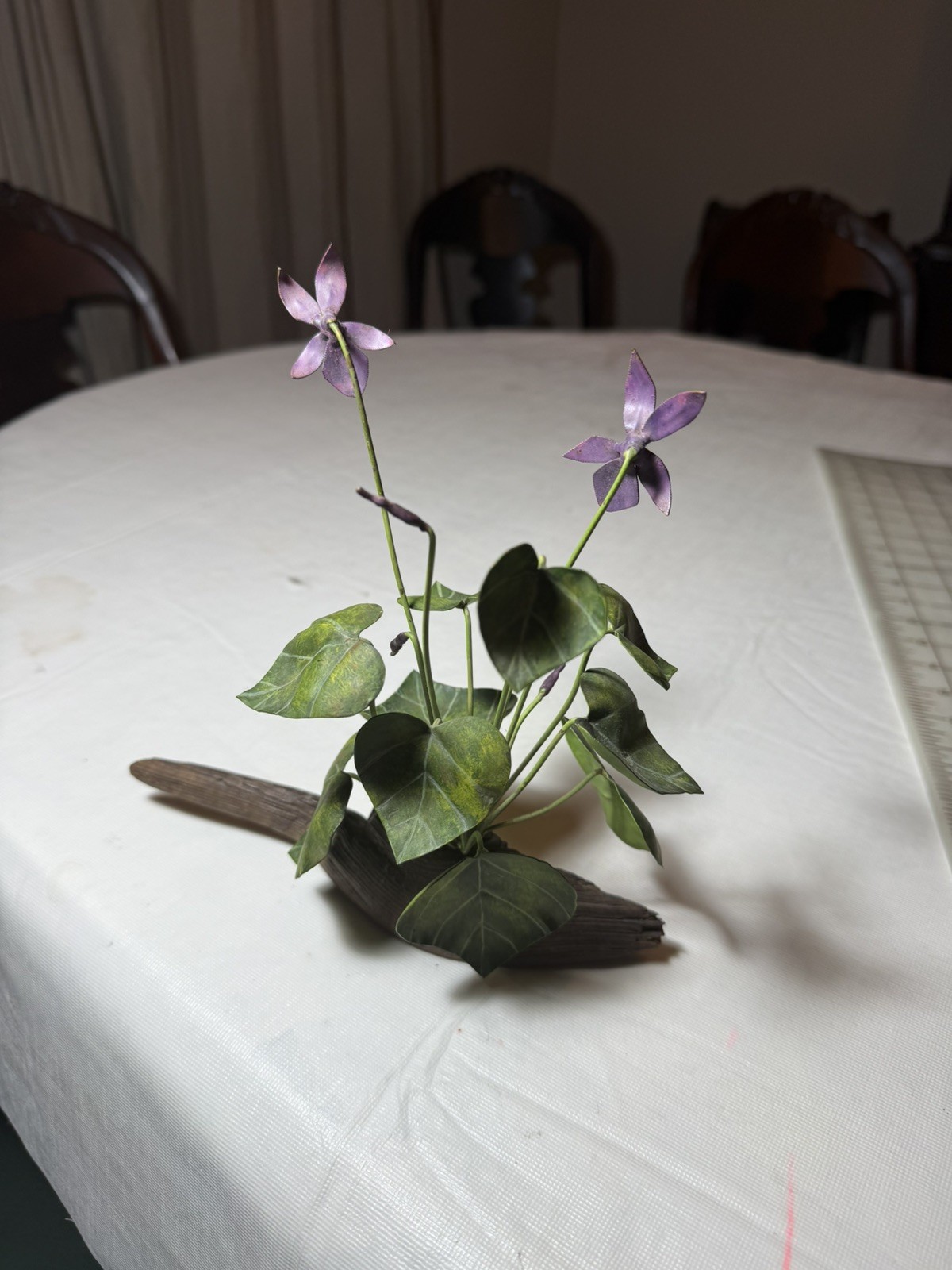 Gorgeous purple, violets, in metal Flower Arrangement – 8 x 8” wood vase