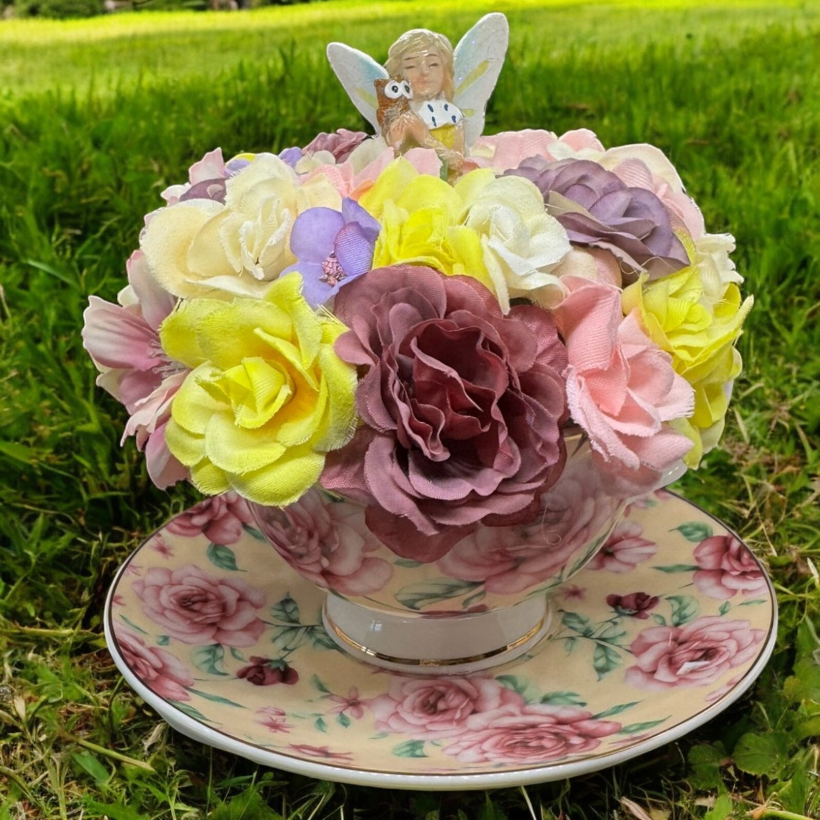 Pink Tea Cup Fairy Flower arrangement With Fairy