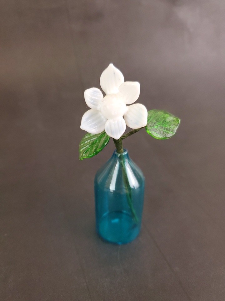 Tiny Glass Flower in Blue Vase 3.5″ tall – White Glass Flower & Green Leaves