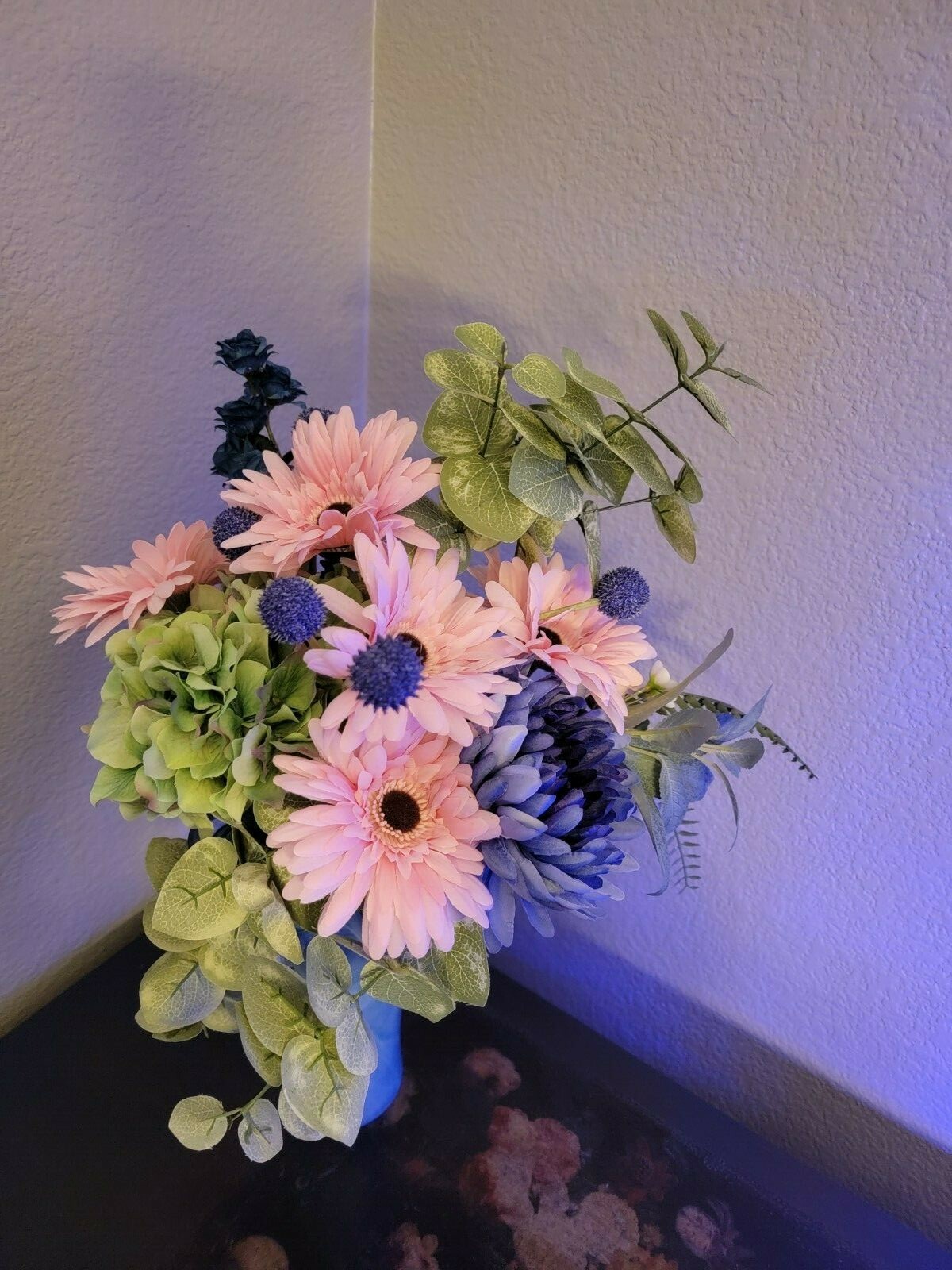 Mixed Artificial Floral Arrangement In a Murano light blue Vase