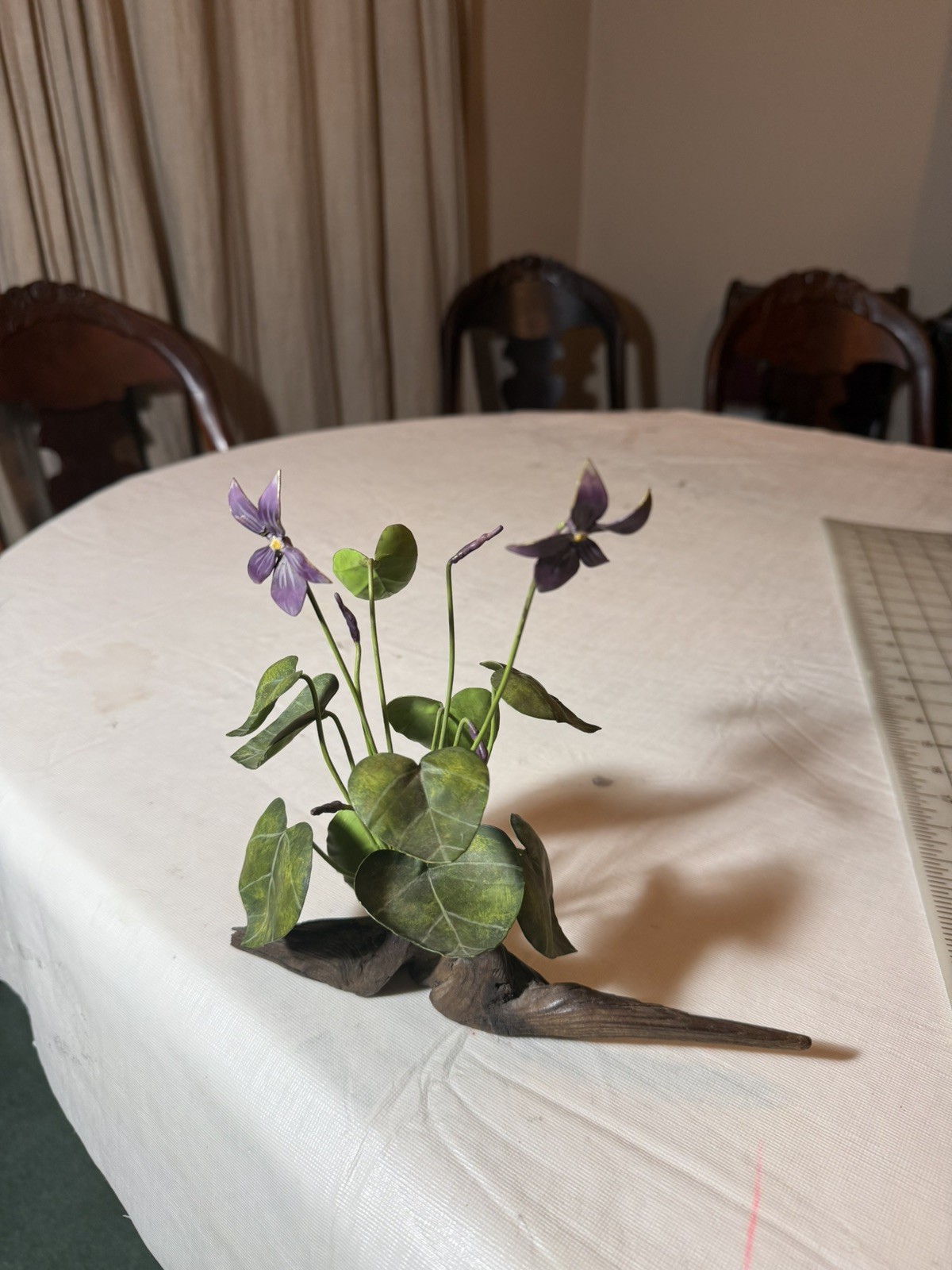 Gorgeous purple, violets, in metal Flower Arrangement – 8 x 8” wood vase
