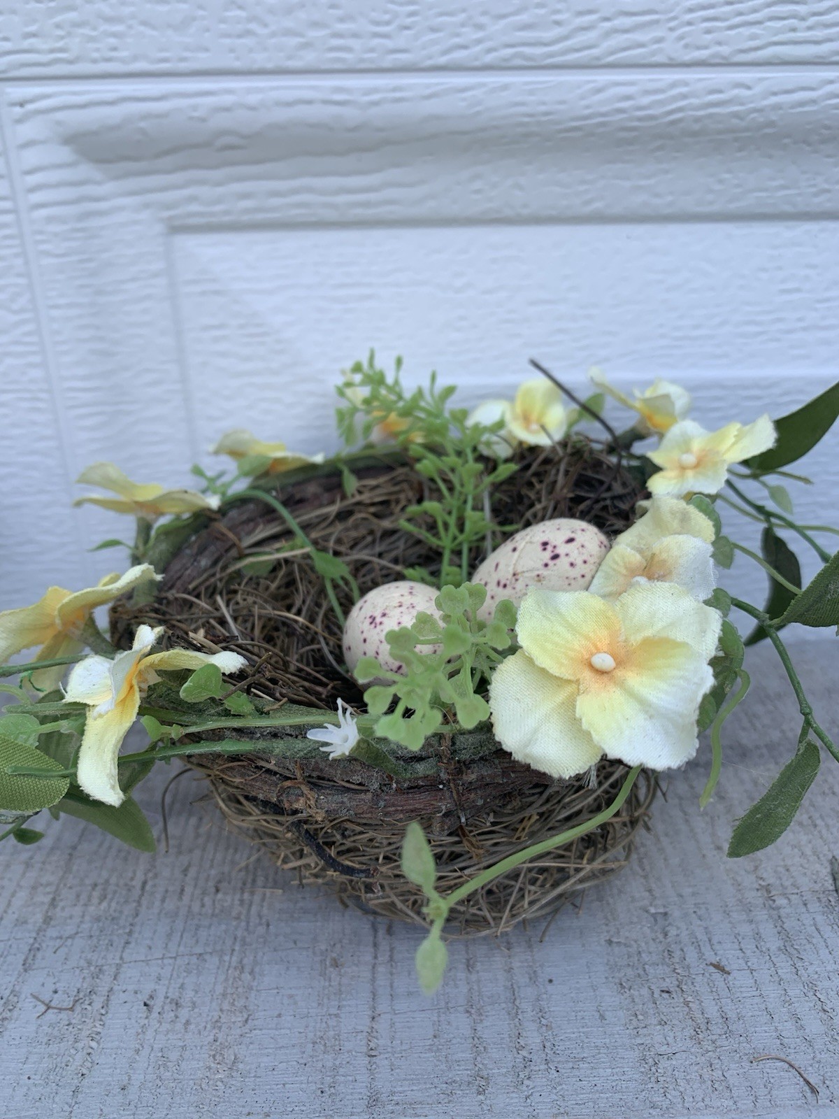 Decorative Bird’s Nest With 2 Faux Eggs And Yellow Artificial Flowers Spring