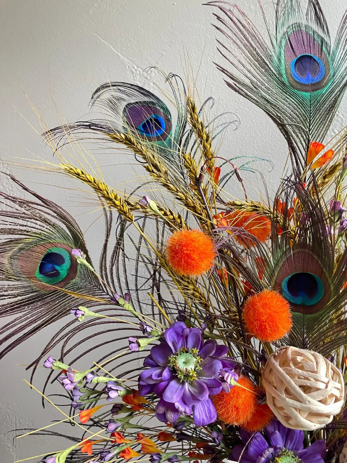 Peacock Centerpiece: Earthy Floral Arrangement, Cute Purple & Orange Room Decor