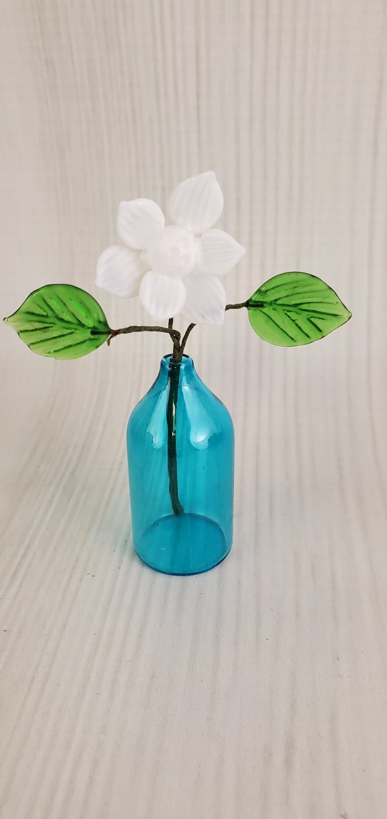 Tiny Glass Flower in Blue Vase 3.5″ tall – White Glass Flower & Green Leaves