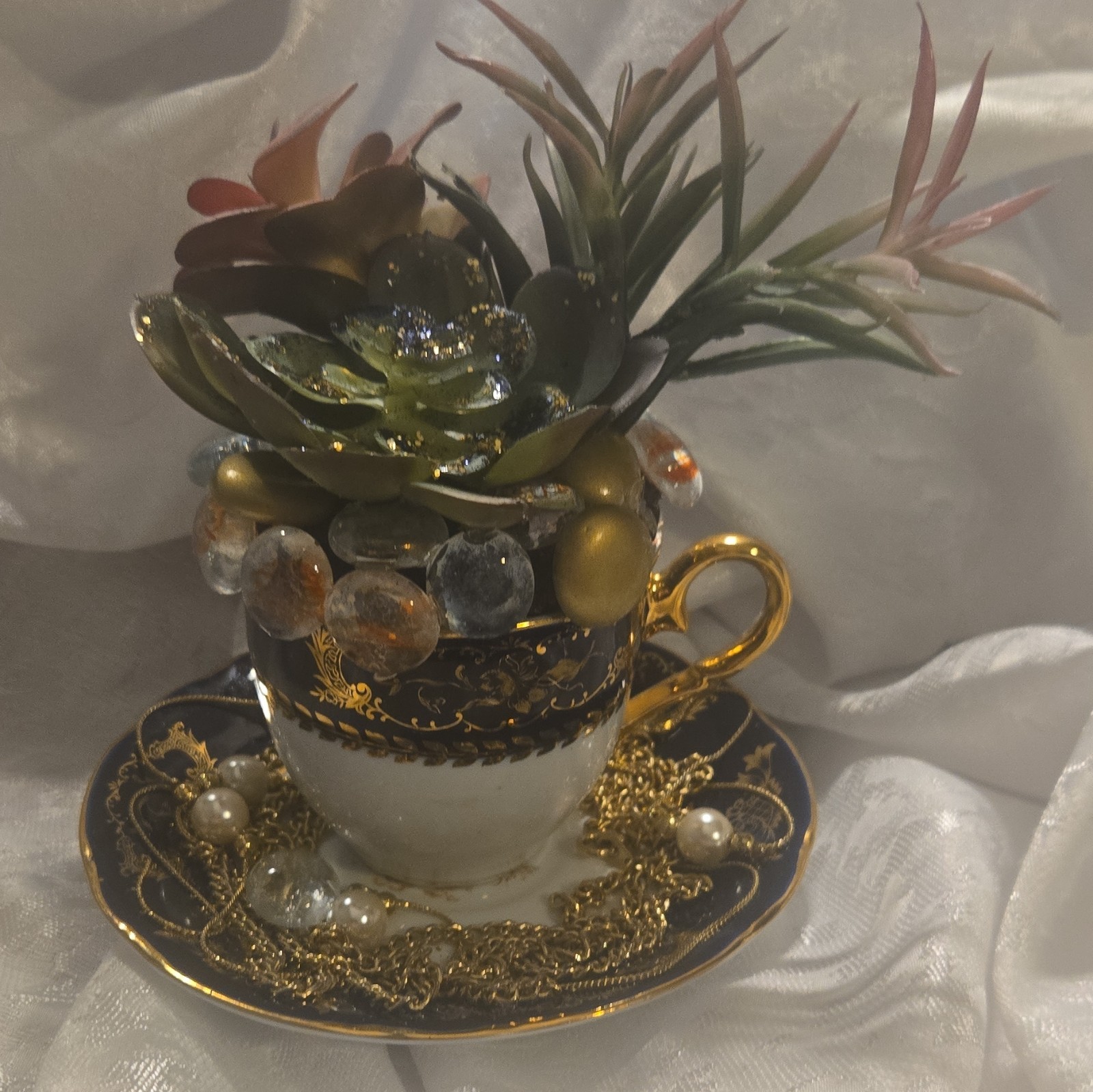 Artificial Succulent Floral Arrangement Ceramic Teacup & Saucer, Beads Chain