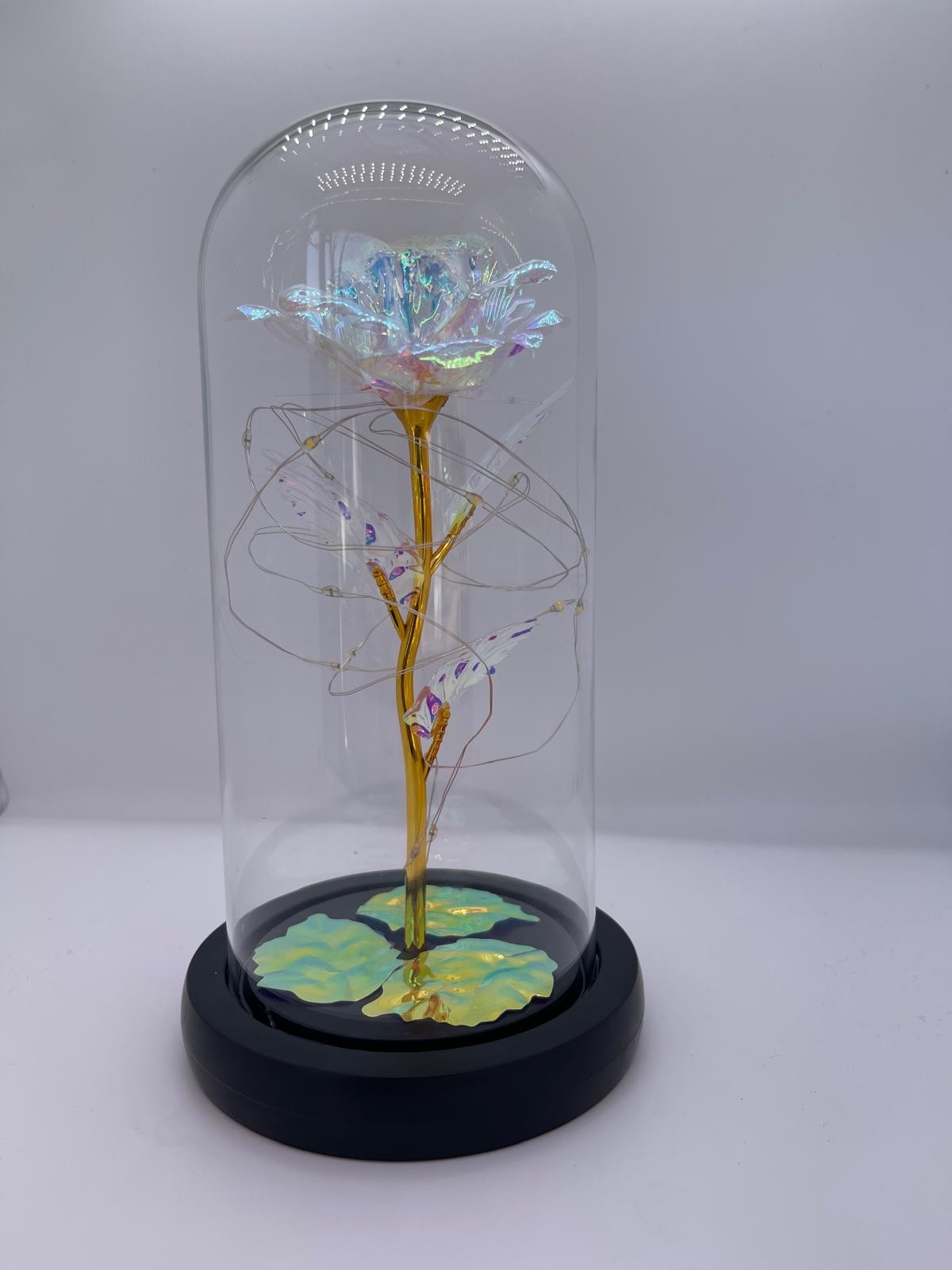 Eternal rose in a transparent dome with LED light. Valentine’s Day Gift