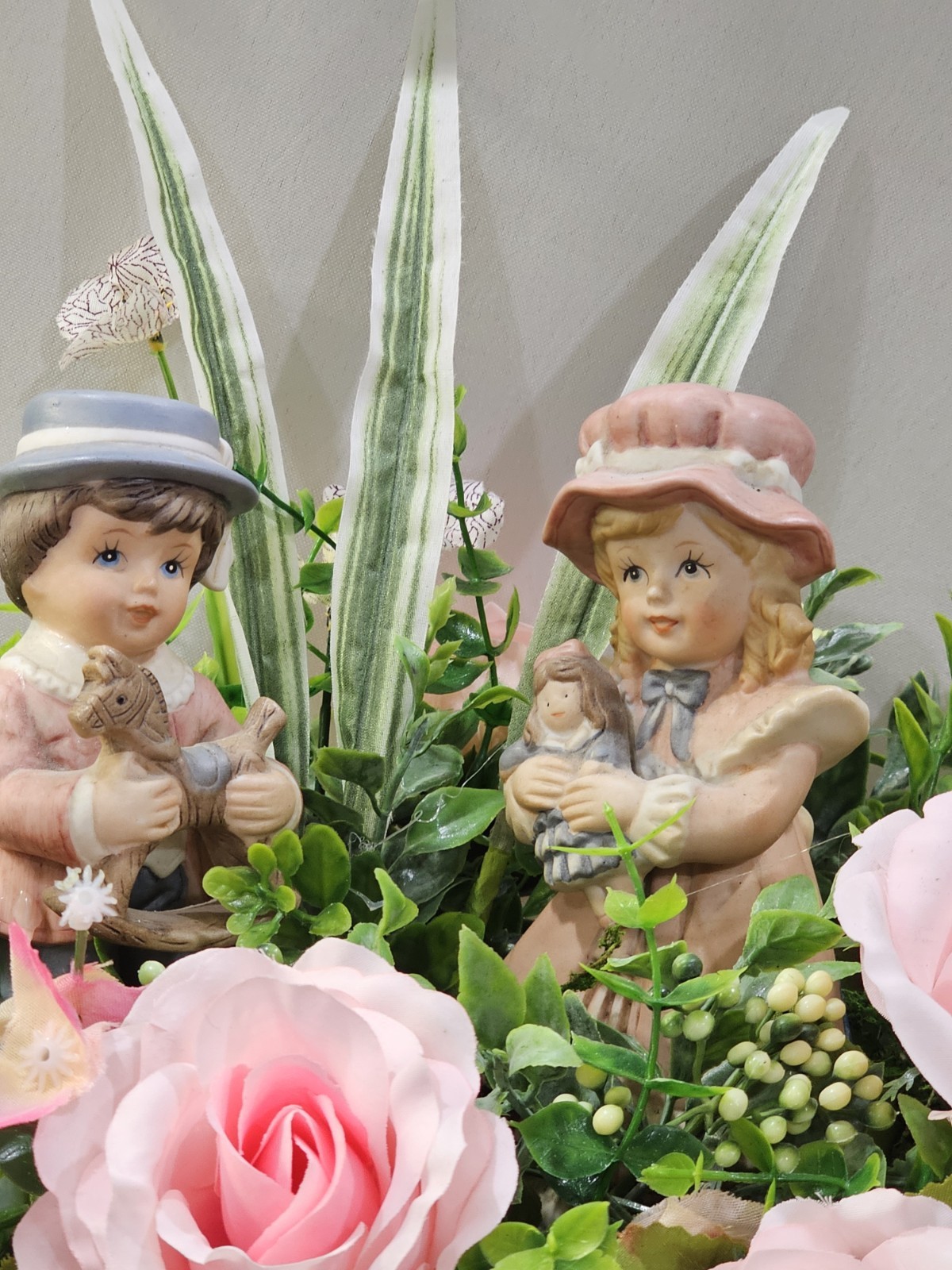 Lovely Floral Centerpiece, Pink Roses, 2 darling children. 15″W in solid wood