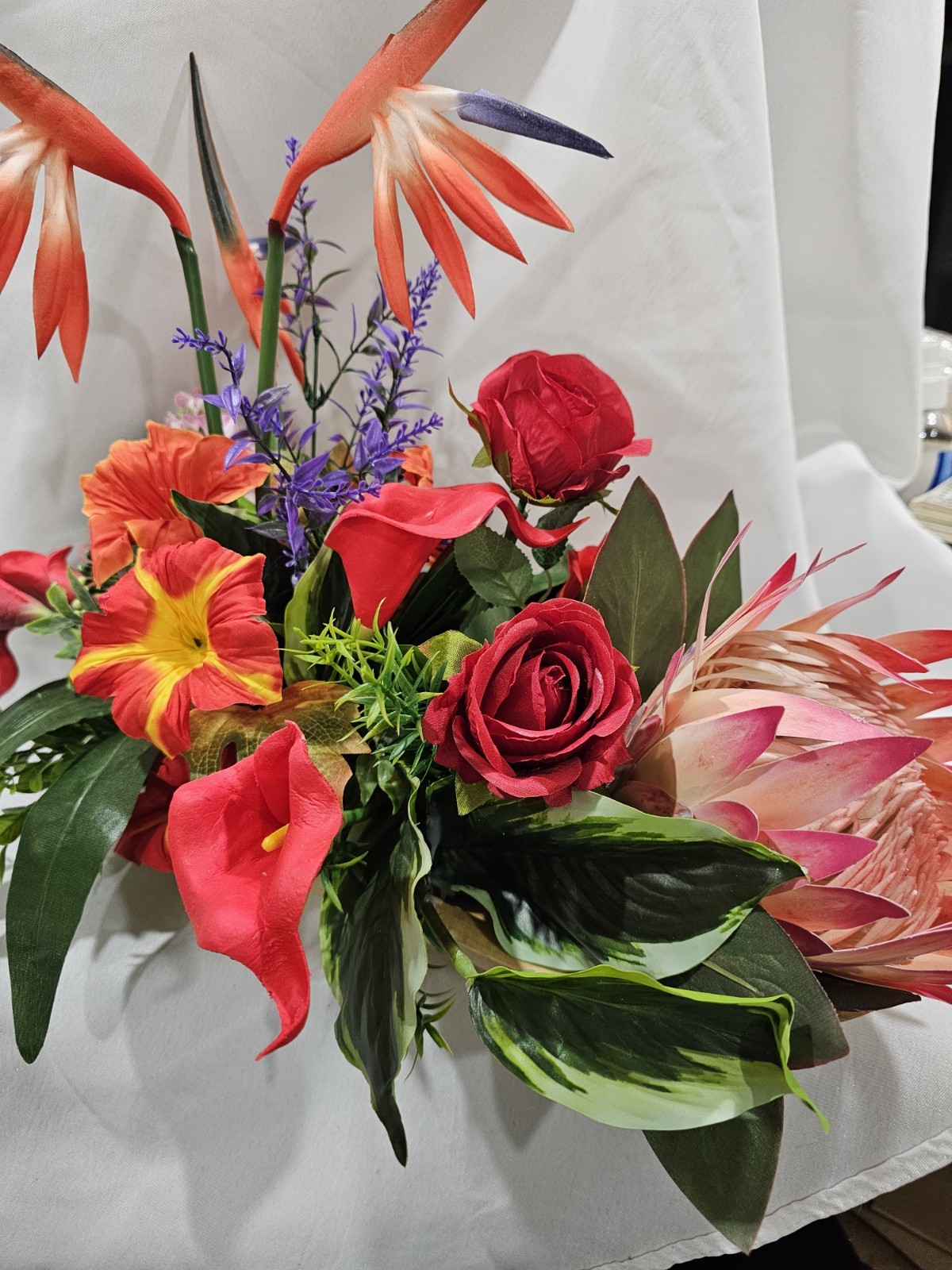 Bright Colors in this Artificial Tropical arrangement, Birds of Paradise etc.