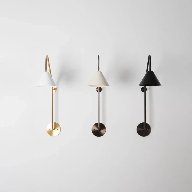 The Ellis Light is made from solid brass, with an optional leather wrap that is