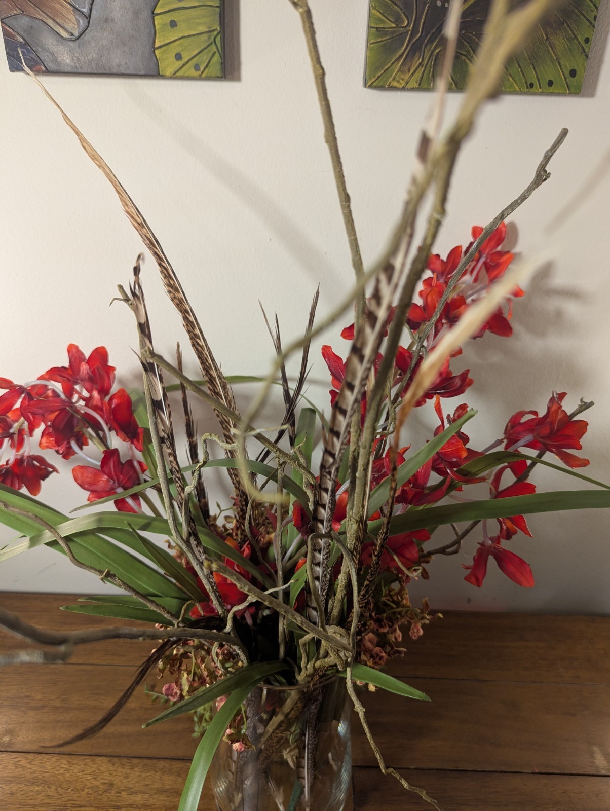 Faux Floral Arrangement With Clear Circular Vase Red Orchards Trailing Greenery