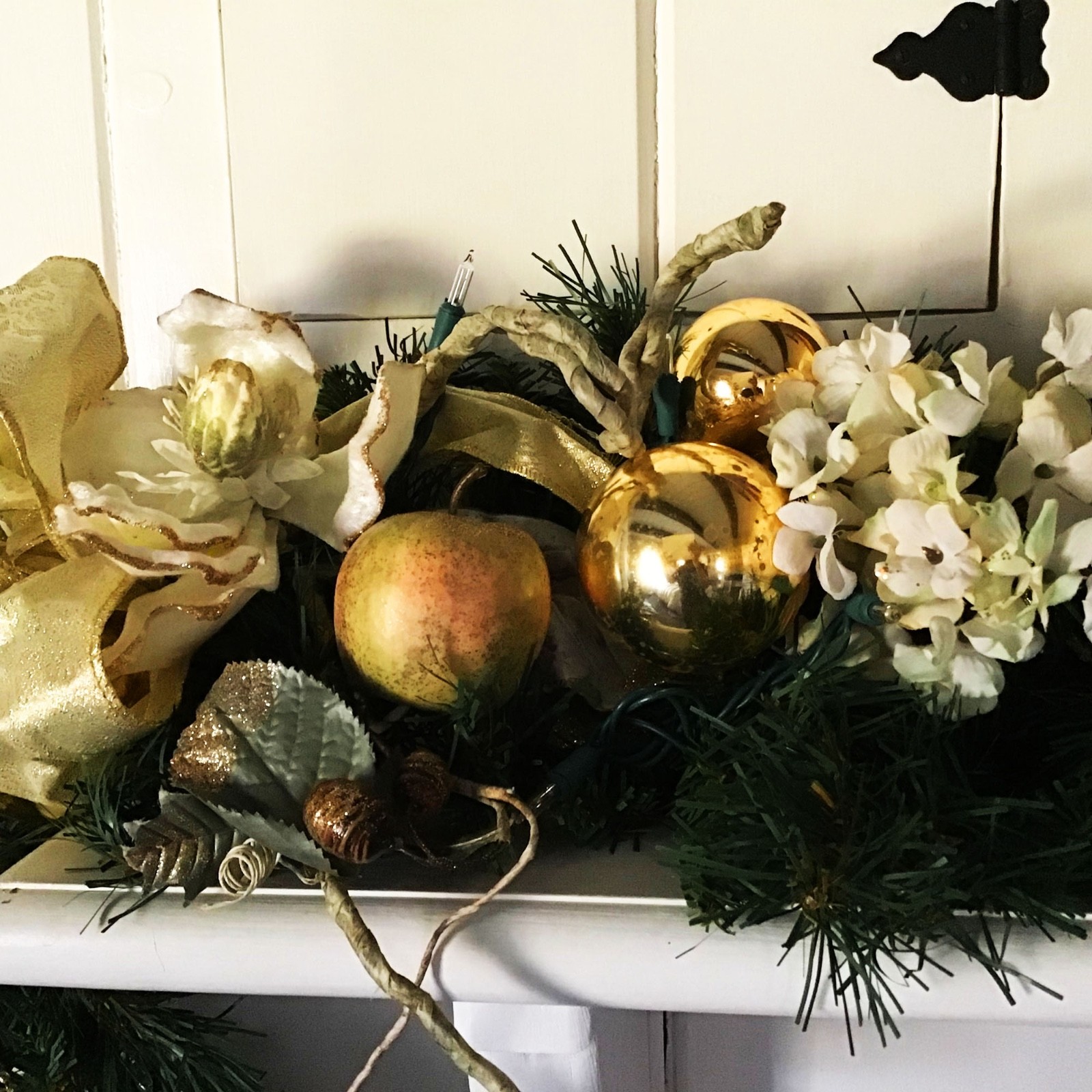 Holiday Swag with white silk Magnolias Hydrengeas Silver Glass Bubbles Gold