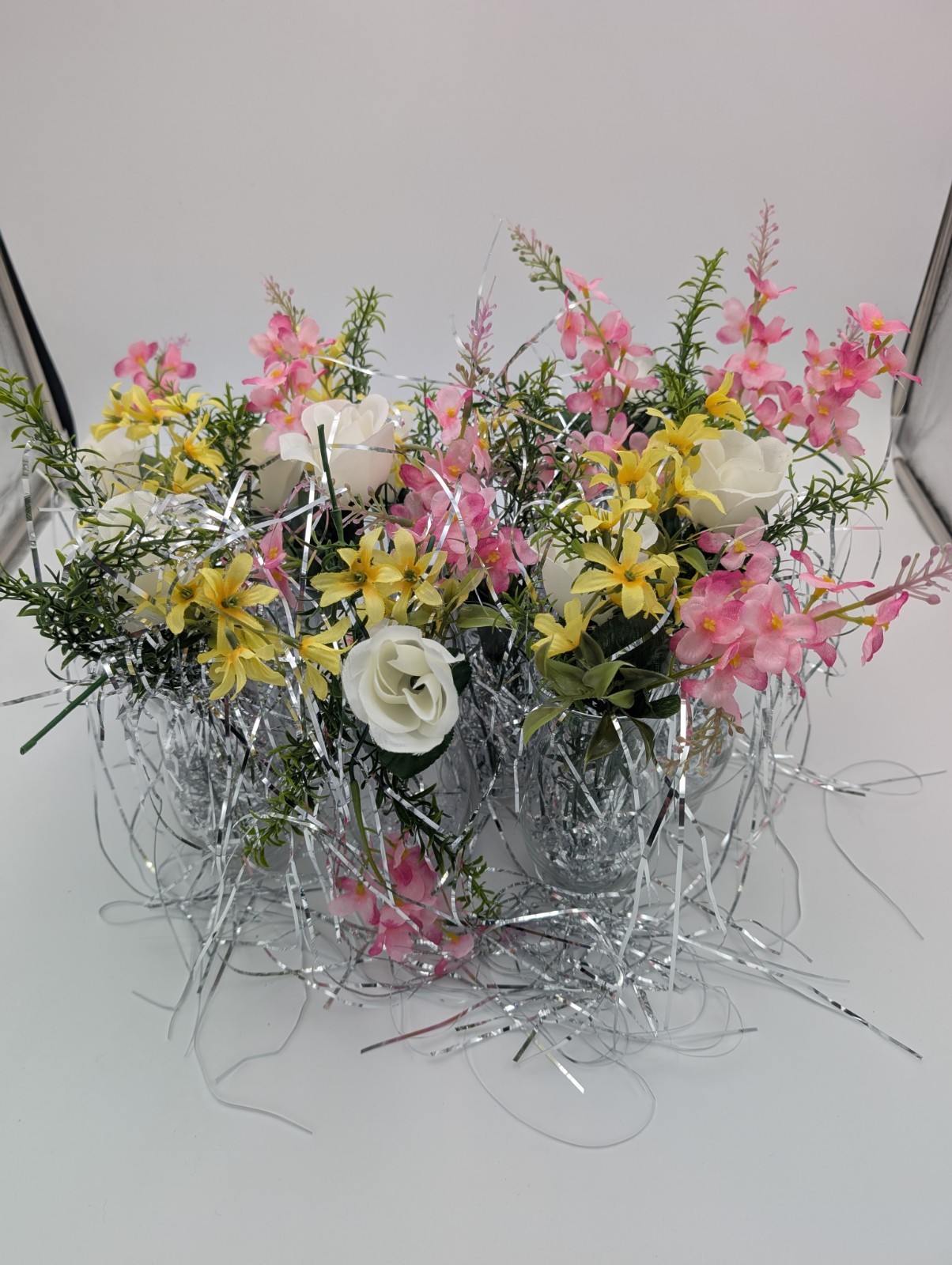 12 Vases with tinsel artifical flowers clear stones