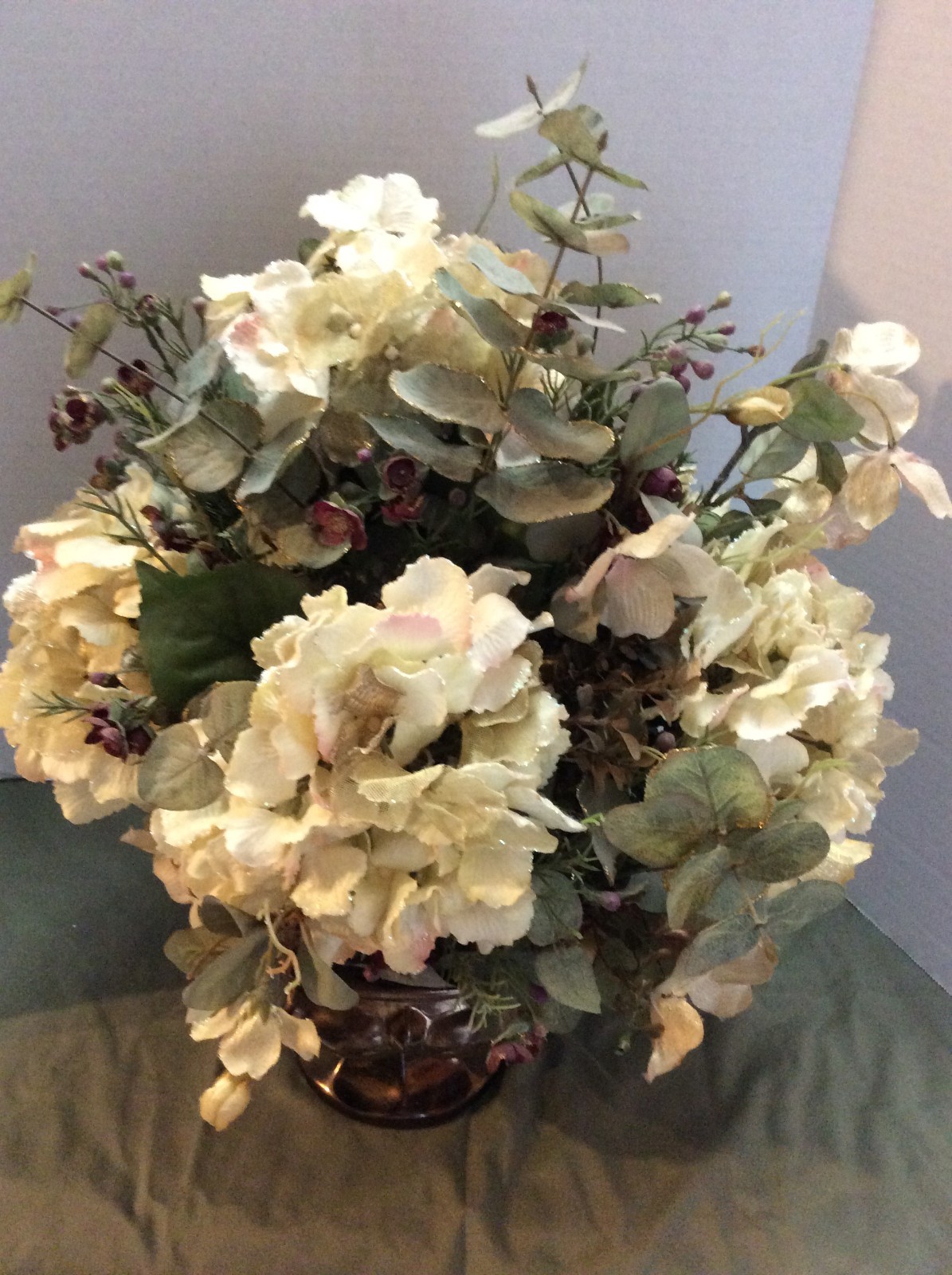 Beautiful Floral Arrangement in Bronze Colored Glass Vase