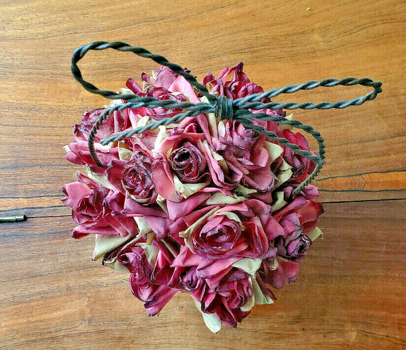 Artificial Fall Bouquet Of Roses In A Black Intertwined Wired Basket