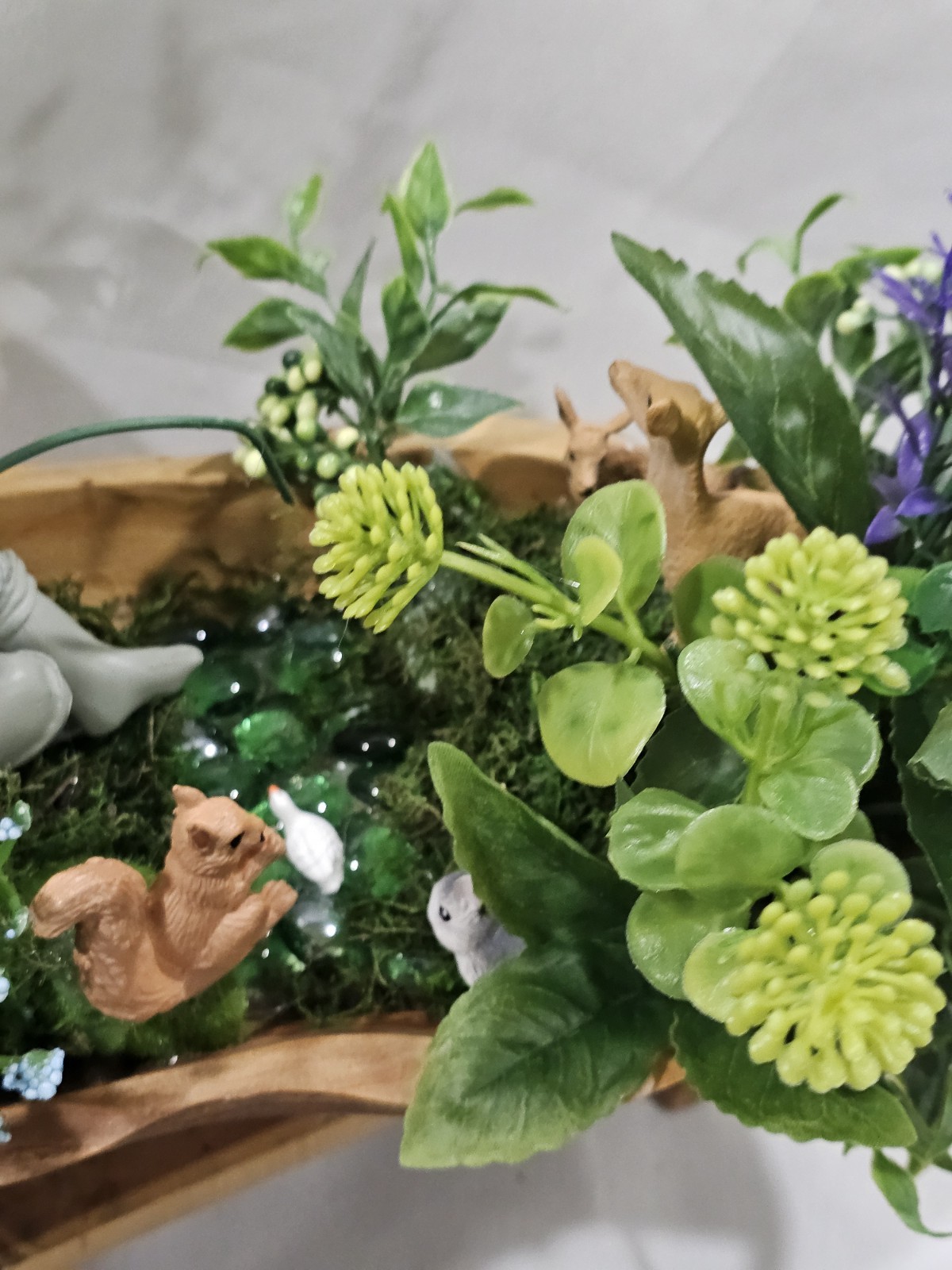 Artifical Flower Arramgement in woods, Boy Fishing Deer, Turtle Duck