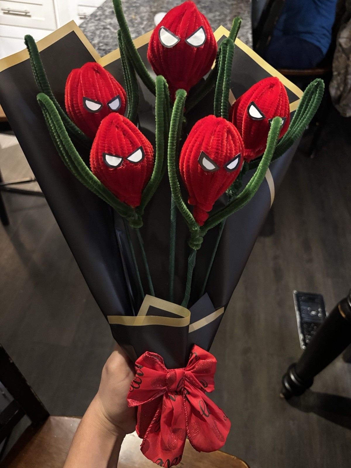 Artificial Spider-Man Themed Red Flower Bouquet with Black Wrap and Red Bow