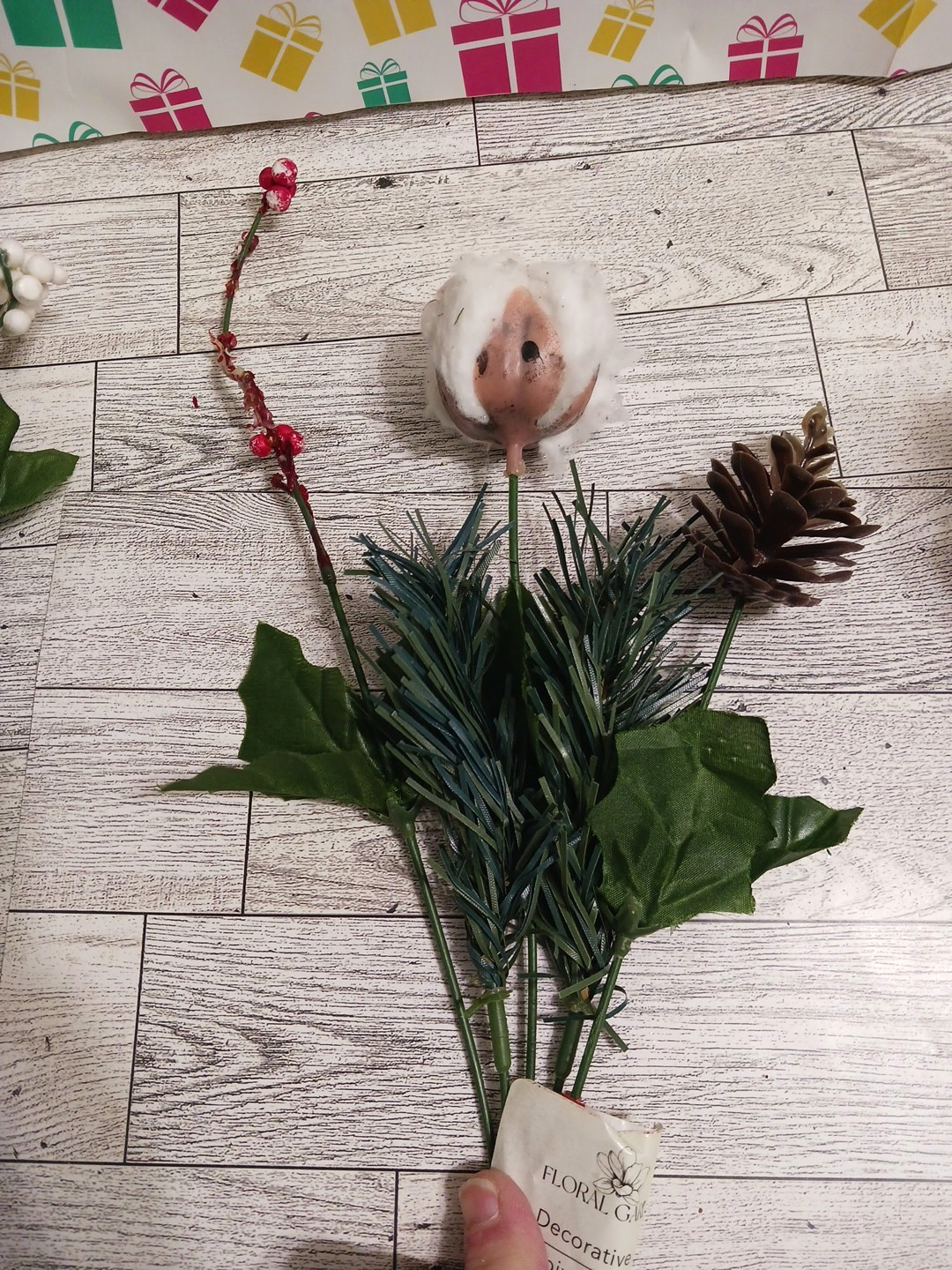 Cotton buds, pine cones, holly berry. Beautiful winter fall flower bouquets