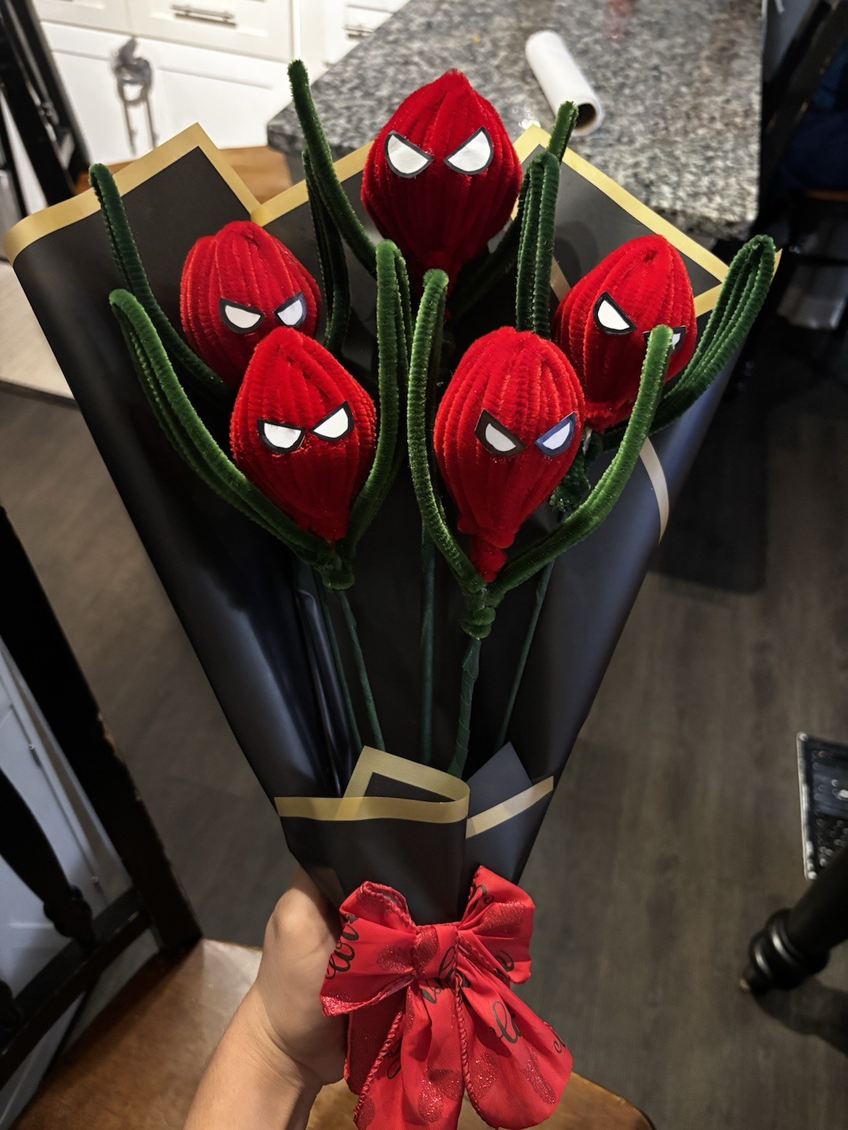 Artificial Spider-Man Themed Red Flower Bouquet with Black Wrap and Red Bow