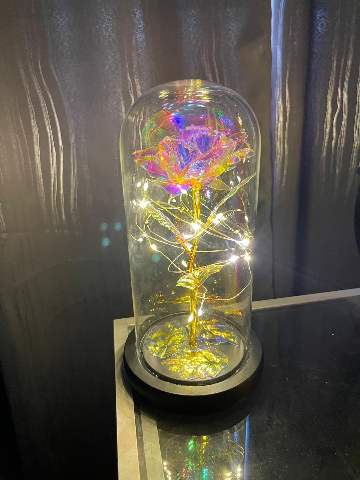 Eternal rose in a transparent dome with LED light. Valentine’s Day Gift