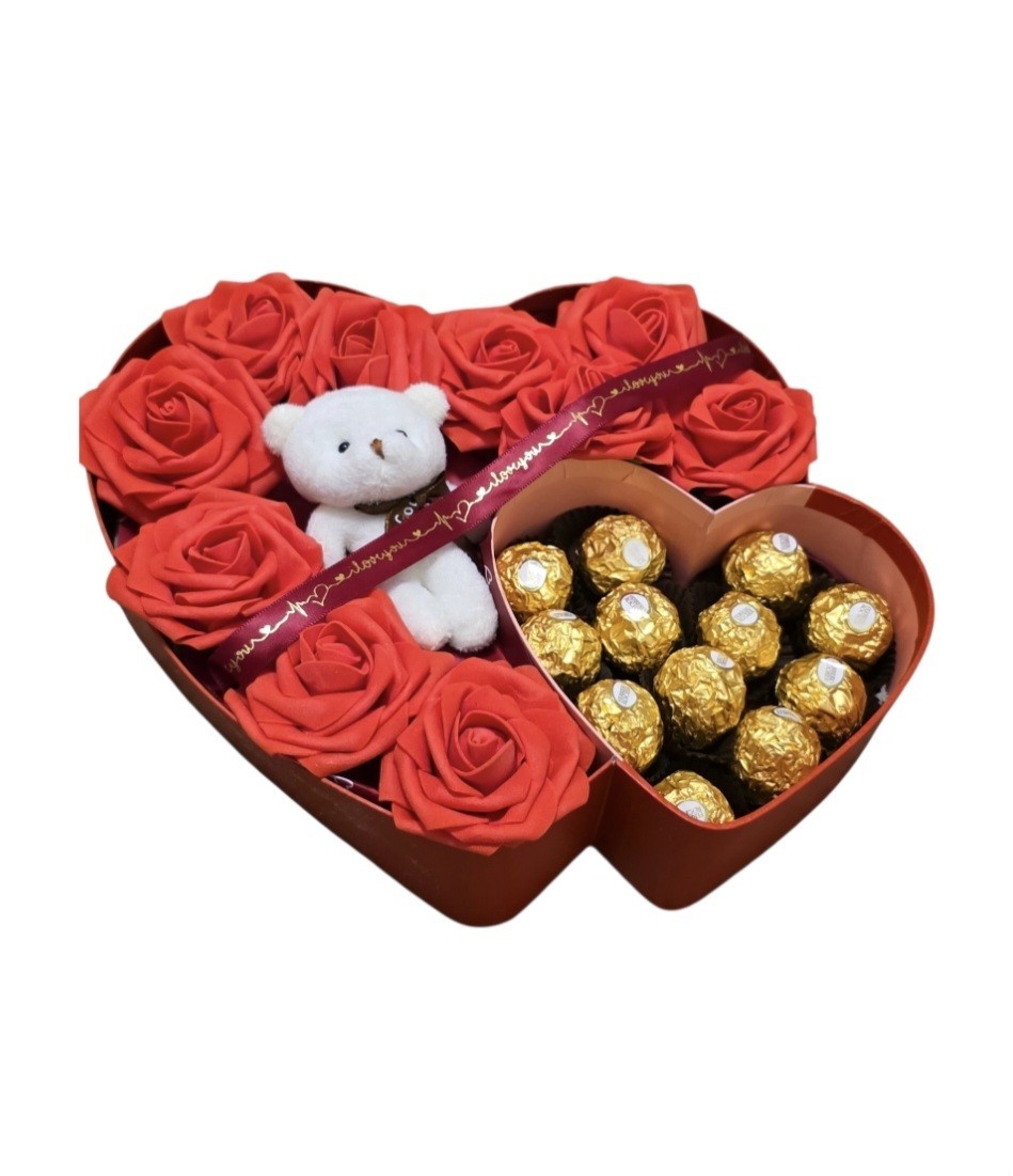 Eternal red flowers with a box in the shape of a red heart, chocolate/bear.