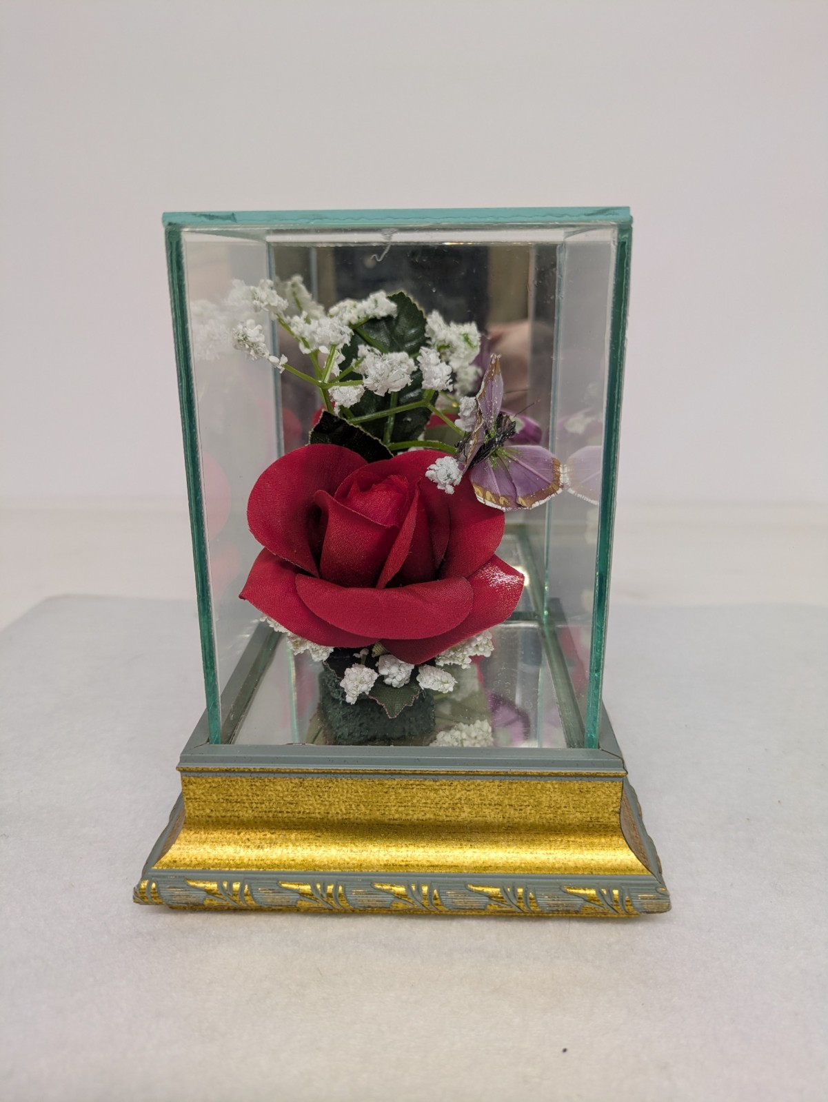 RED ROSE IN GLASS WITH PURPLE BUTTERFLY
