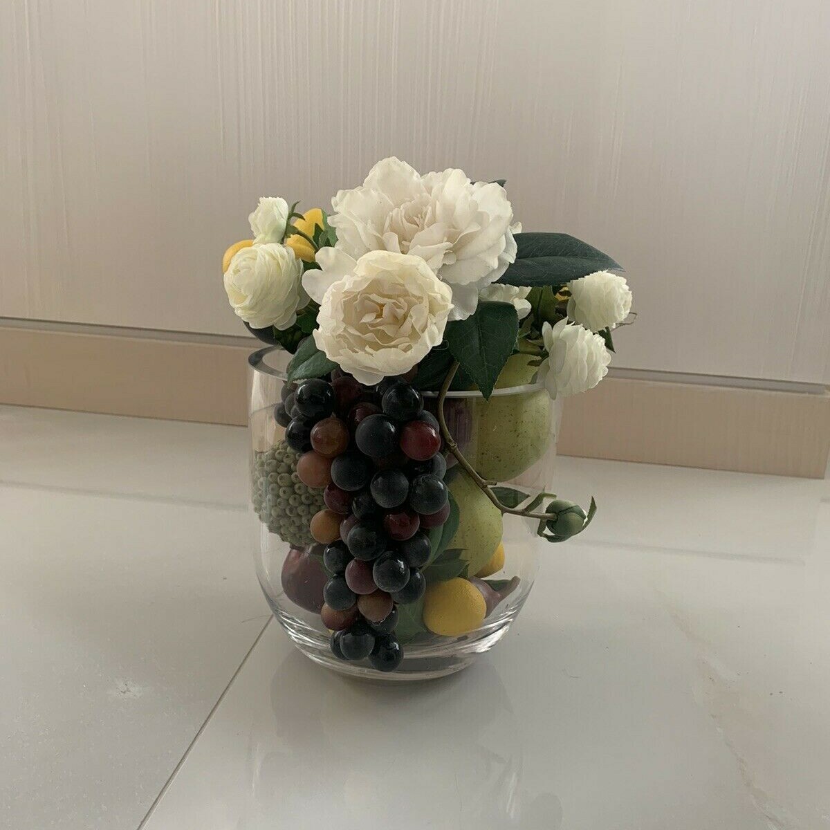 Pomegranate, Lemon, Grapes with Flower Centerpiece Arrangement with Clear Vase 
