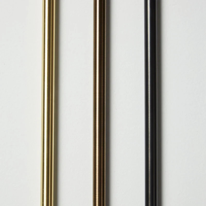 The Perry Double Sconce features solid brass hardware and powder coated aluminum