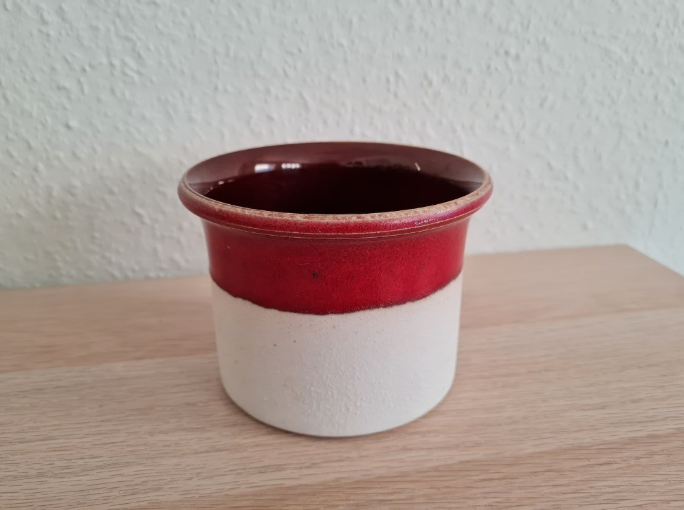 Red and white ceramic flower pot