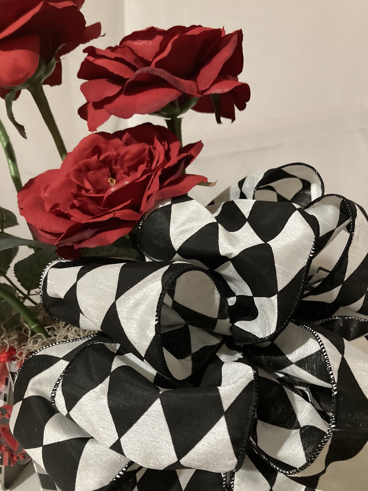 Valentine Red Roses With Black & White Checked Container