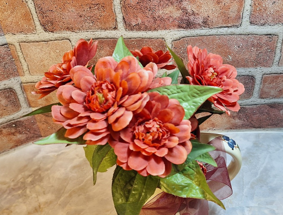 Floral Arrangement Centerpiece with Red Zinnia Faux Flowers in a Grape Vine Vase