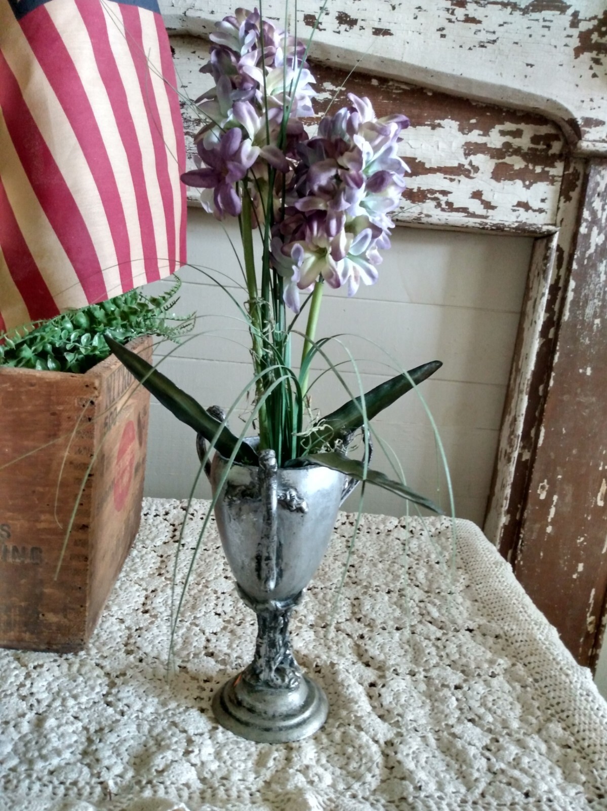 faux flower in urn