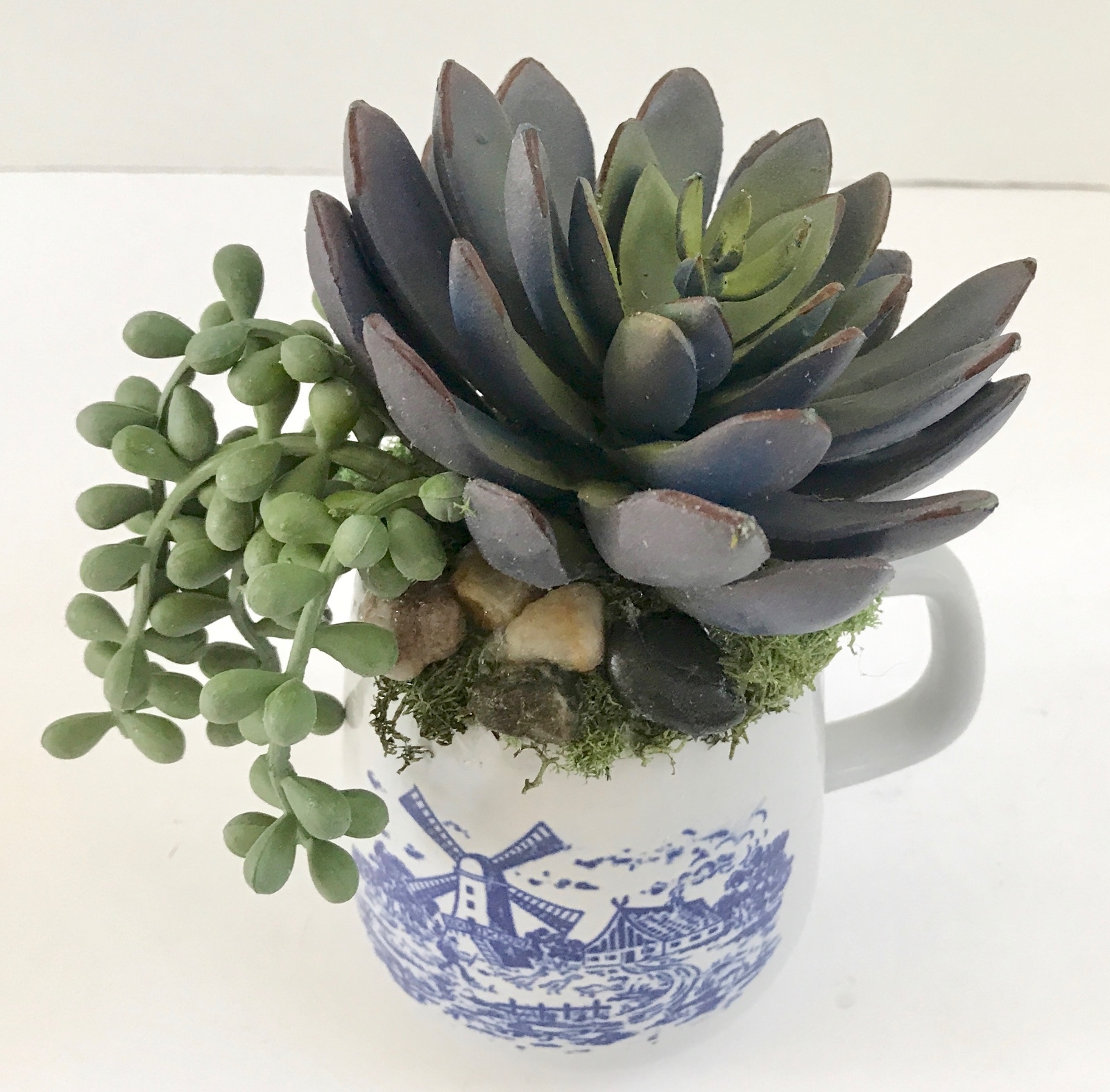 Decorative Artificial Purple and Green Grass Succulents in a Blue and White Mug