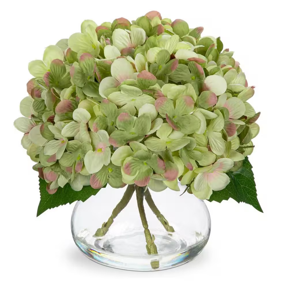 Green Artificial Flowers Paired with a Glass Vase Ornaments