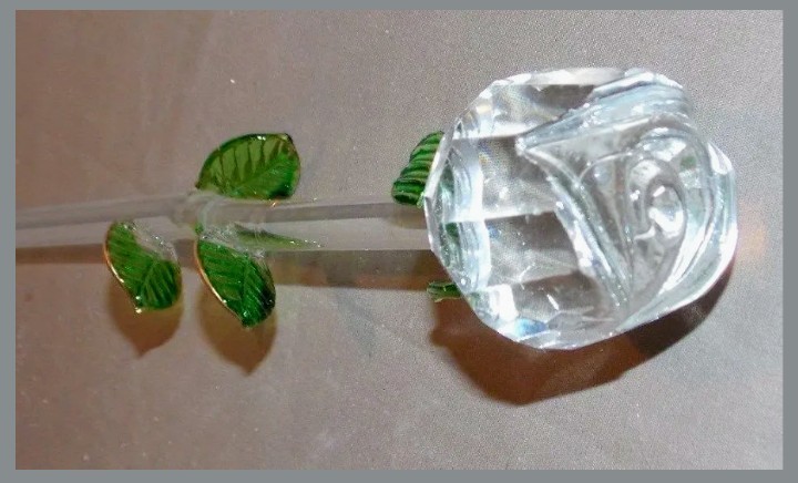 8 pc Hand blown Glass Roses with delicate green leaves on long stem.