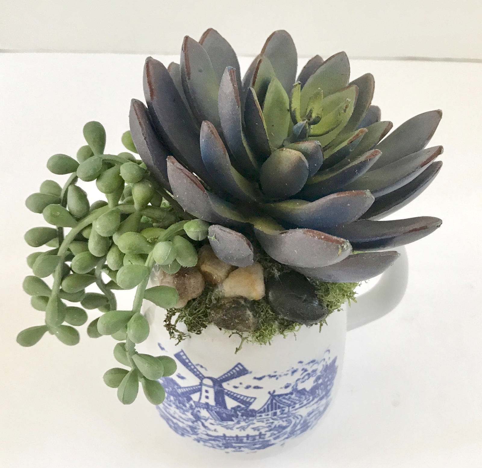 Decorative Artificial Purple and Green Grass Succulents in a Blue and White Mug