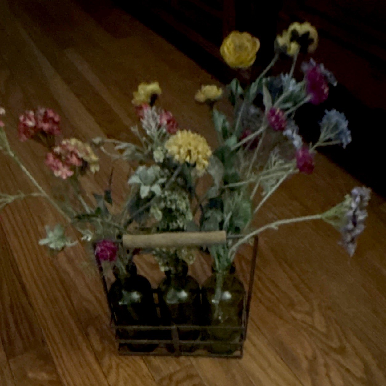 Multicolor Flower Arrangement in Green Glass Bottles with Metal Holder