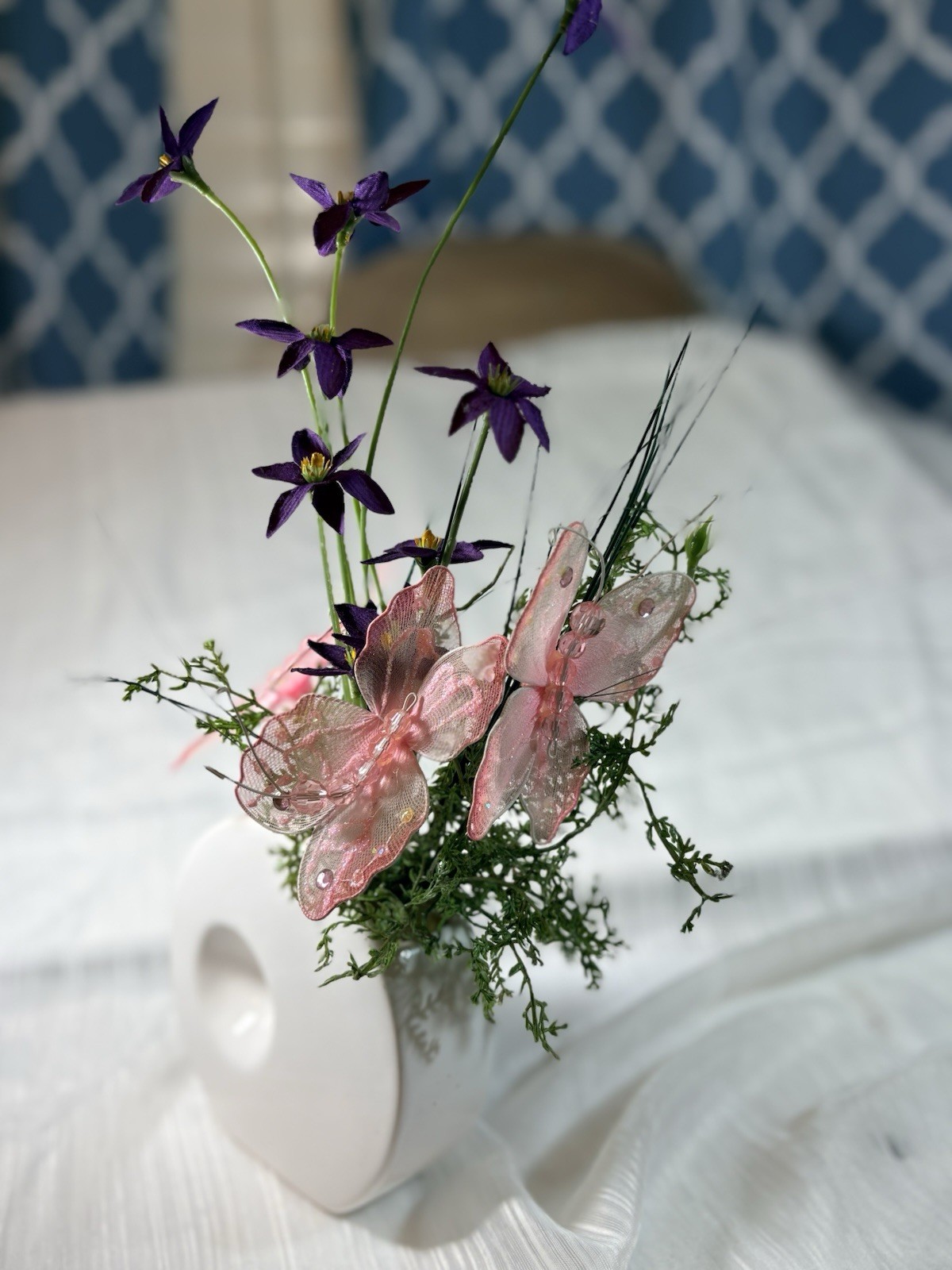 Artificial Purple Flower Arrangement with Pink Butterfly in White Ceramic Vase