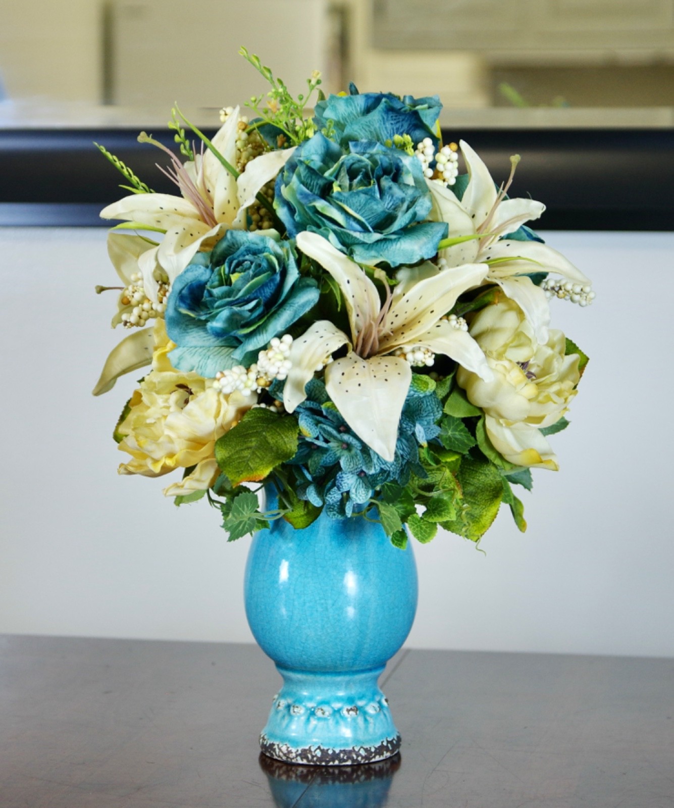 Silk Arrangement of Blue Roses, Hydrangeas and Beige Lilies in Blue Ceramic Vase