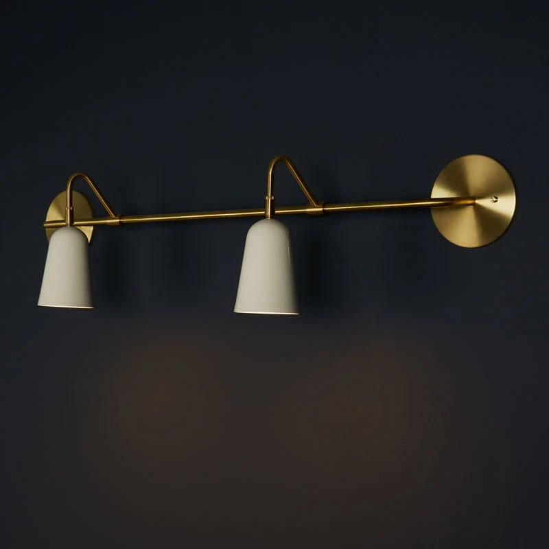 The Perry Double Sconce features solid brass hardware and powder coated aluminum