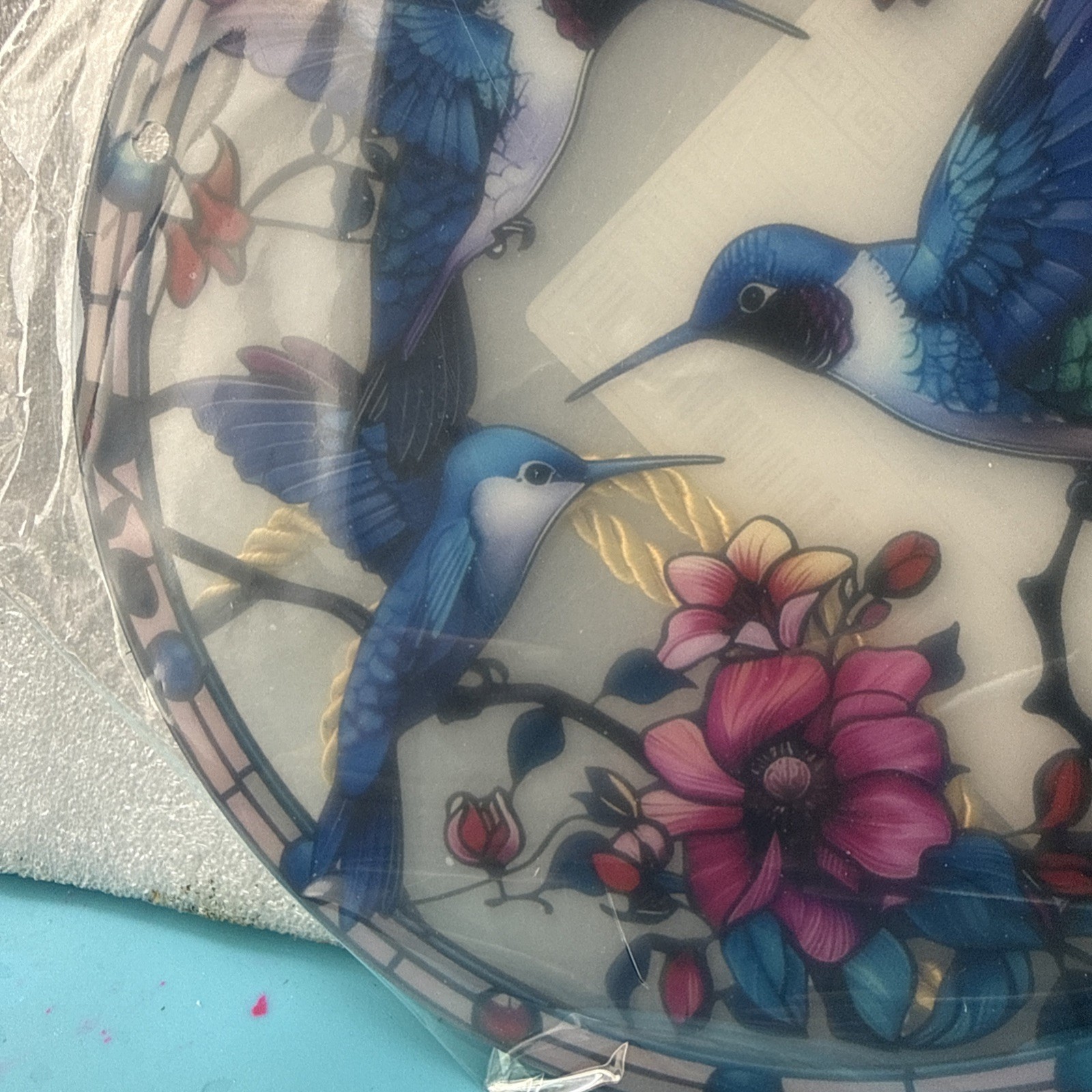 8 inch round acrylic with 3 blue hummingbird