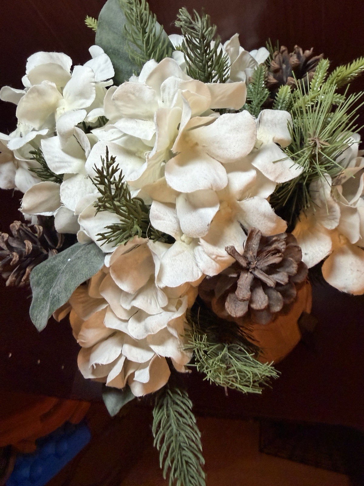Artificial Pine Plant With White Flowers And Pinecones In Stand