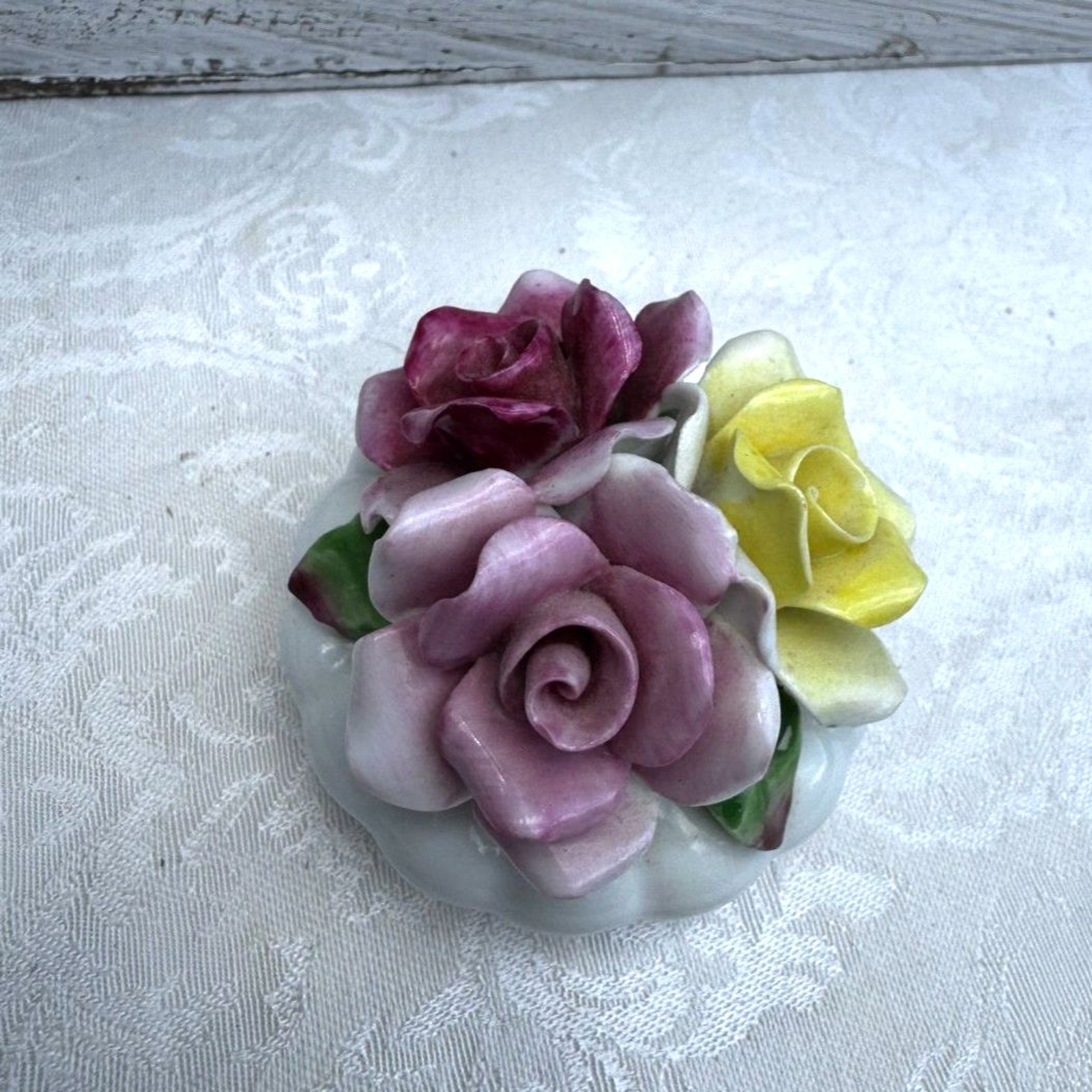 Beautiful vintage bone china flowers in tiny vase red, yellow, pink roses