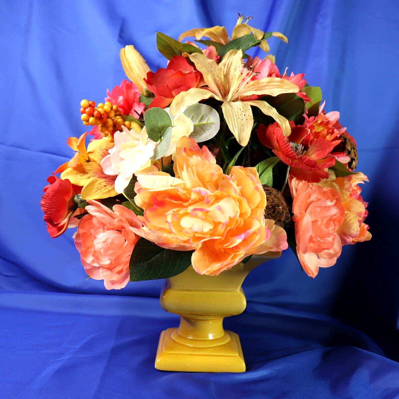 Lovely Floral Arrangement In Shades of Coral Pink & Yellow in a Square Planter