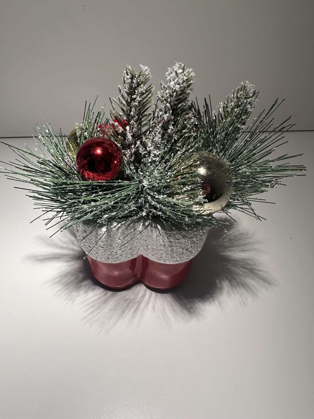 Vintage Concrete Pine Christmas Arrangement in A Pair Of Red Santa Clause Boots