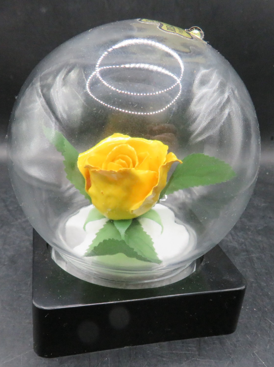 Lifesake Flowers REAL ROSES Yellow Rose In a clear globe on a back base.