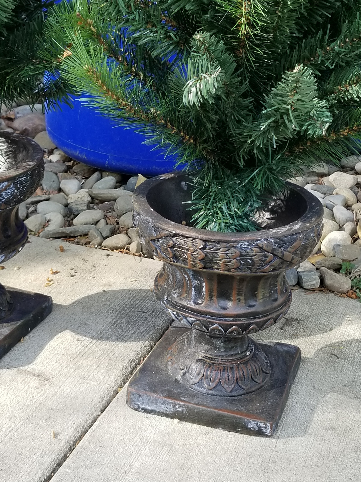 A PAIR OF DECRATIVE ARTIFICIAL FAUX POTTED PORCH PINE PLANTS 4′