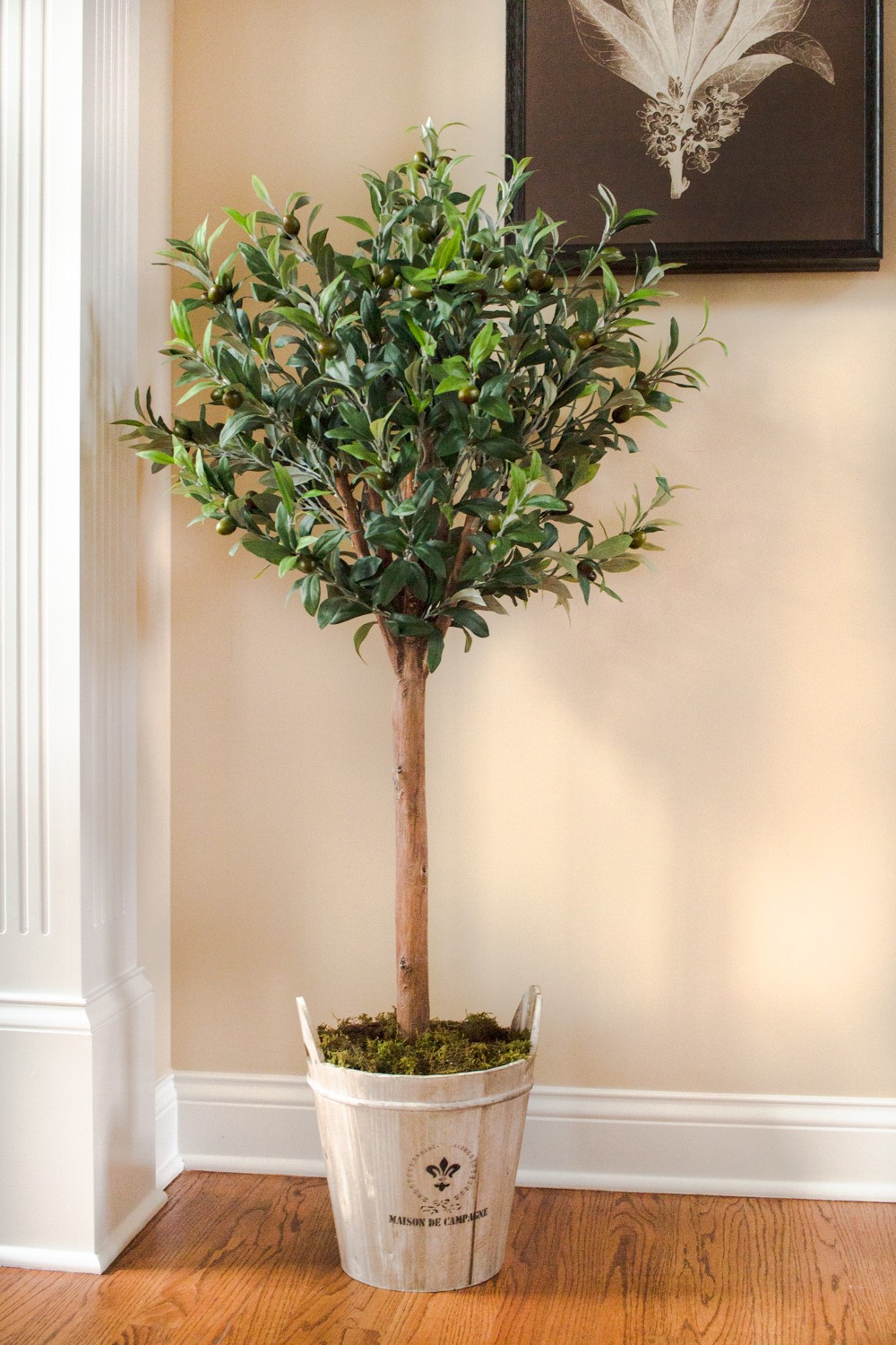 Nearly Natural 4.5ft Olive Topiary Tree with European Barrel Planter in Green